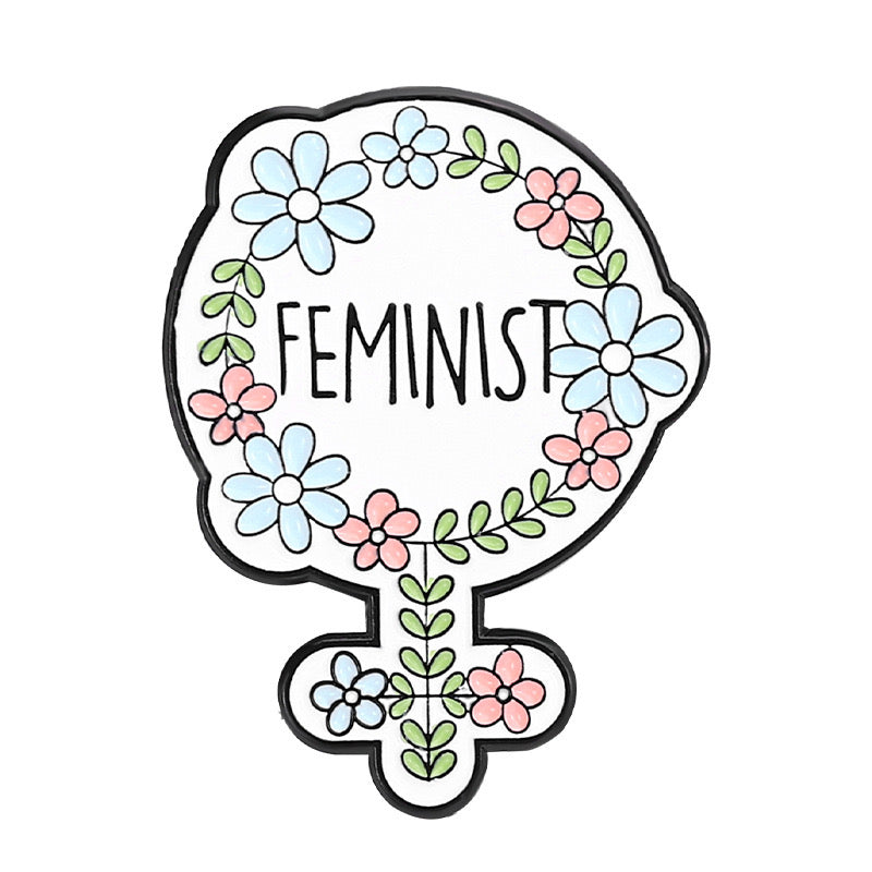 Pin’s féministe symbole féminin fleuri | Pin engagé