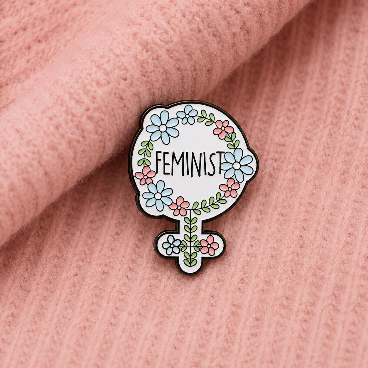 Pin’s féministe symbole féminin fleuri | Pin engagé