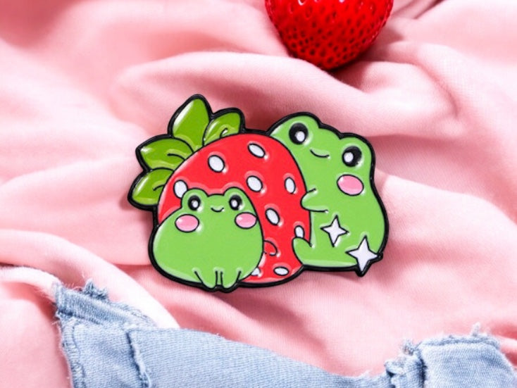 Pin's Broche Email | Grenouille Fraise ou Livre | Amoureux des Grenouilles | Kawaii | Fun | Mignon Dessin Animé